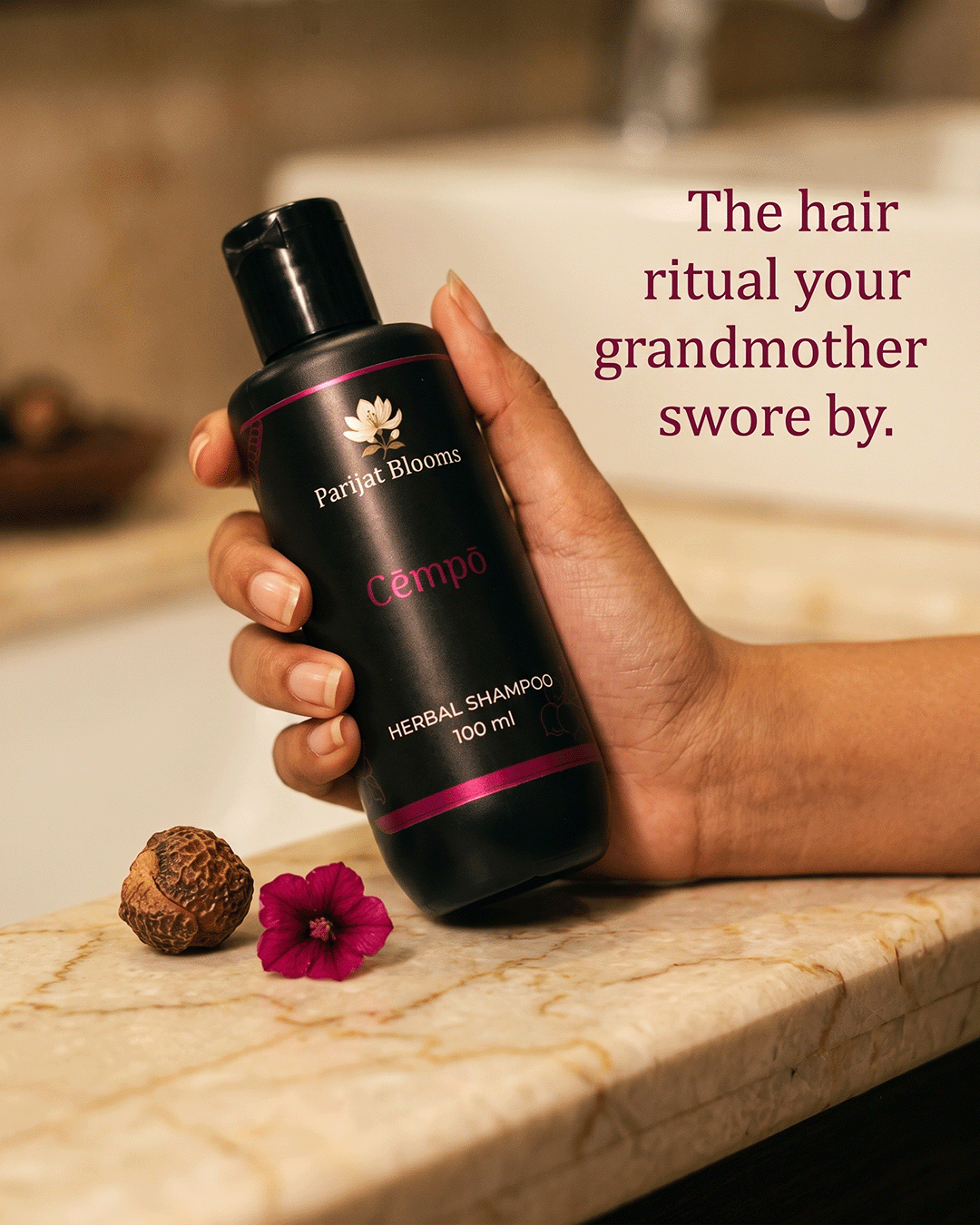 Cempo Herbal Shampoo Ayurvedic ritual shampoo in use — hand holding shampoo Parijat Blooms India