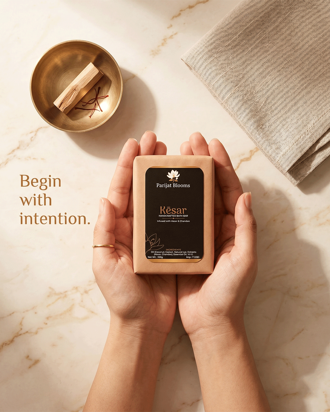 Kesar Handcrafted Bath Bar Ayurvedic ritual soap in use — hand holding soap Parijat Blooms India