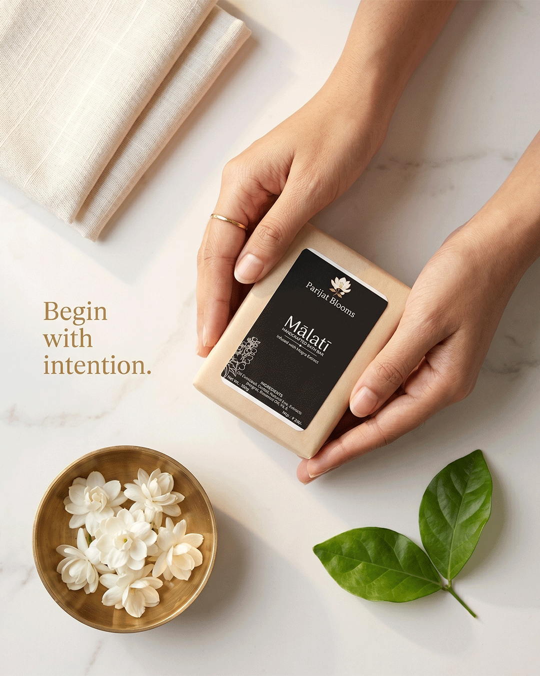 Malati Handcrafted Bath Bar Ayurvedic ritual soap in use — hand holding soap Parijat Blooms India