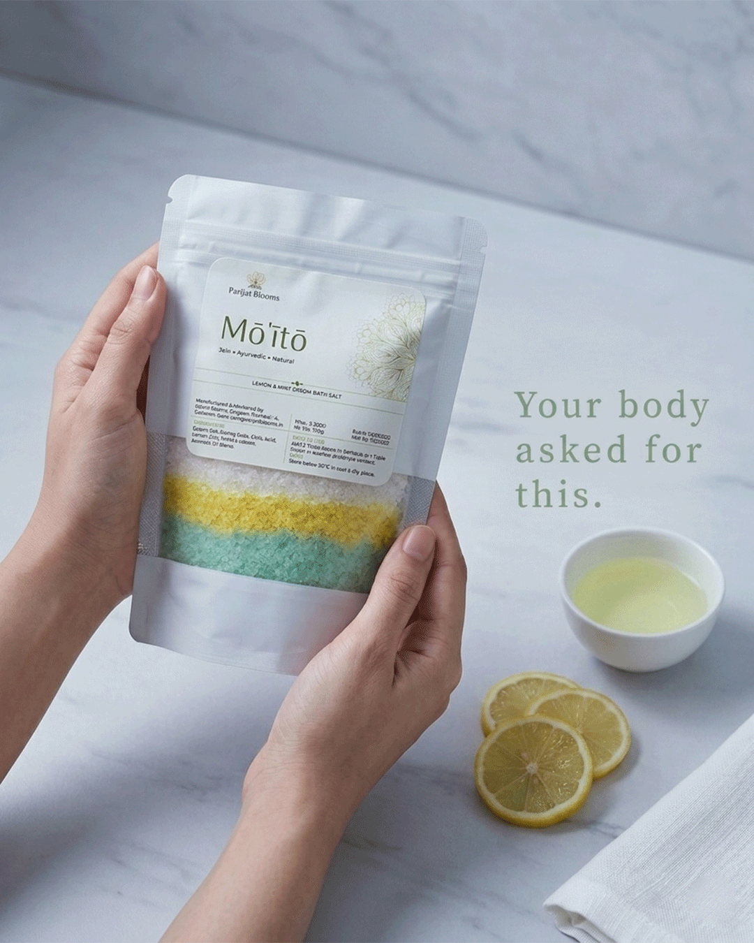 Moito Lemon Mint Epsom Bath Salt Ayurvedic ritual bath salt in use — hand holding bath salt Parijat Blooms India