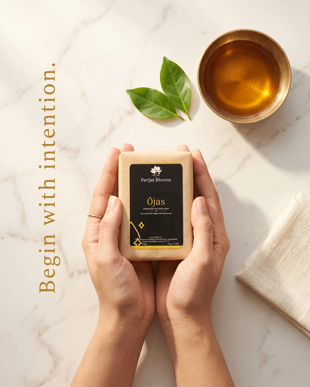 Ojas Handcrafted Bath Bar Ayurvedic ritual soap in use — hand holding soap Parijat Blooms India