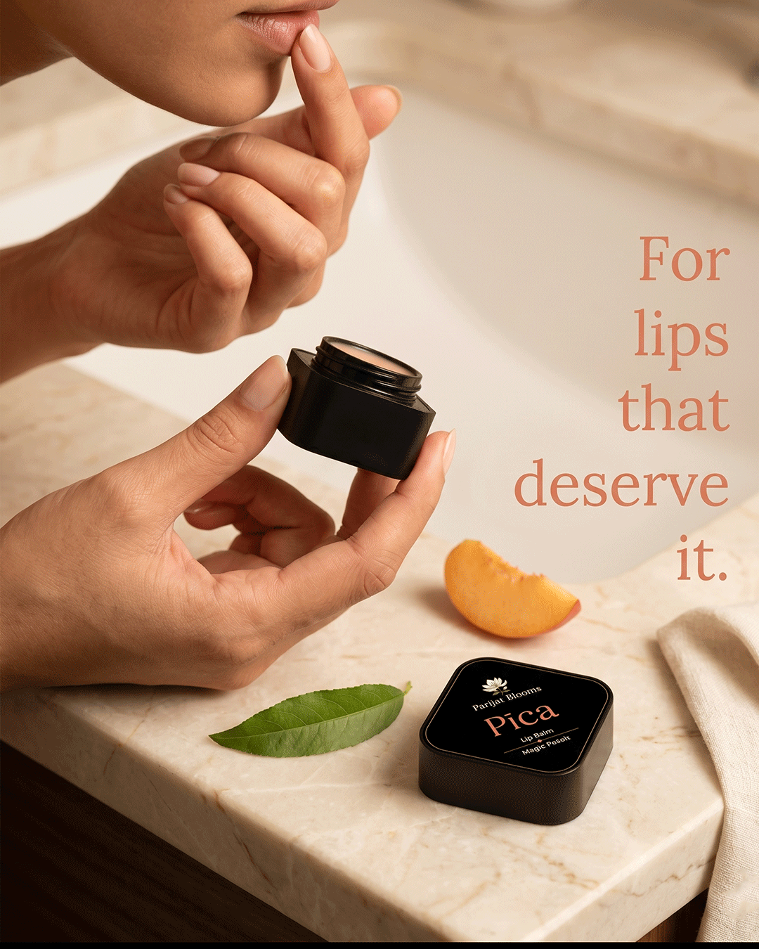 Pica Peach Lip Balm Ayurvedic ritual lip balm in use — hand holding lip balm Parijat Blooms India