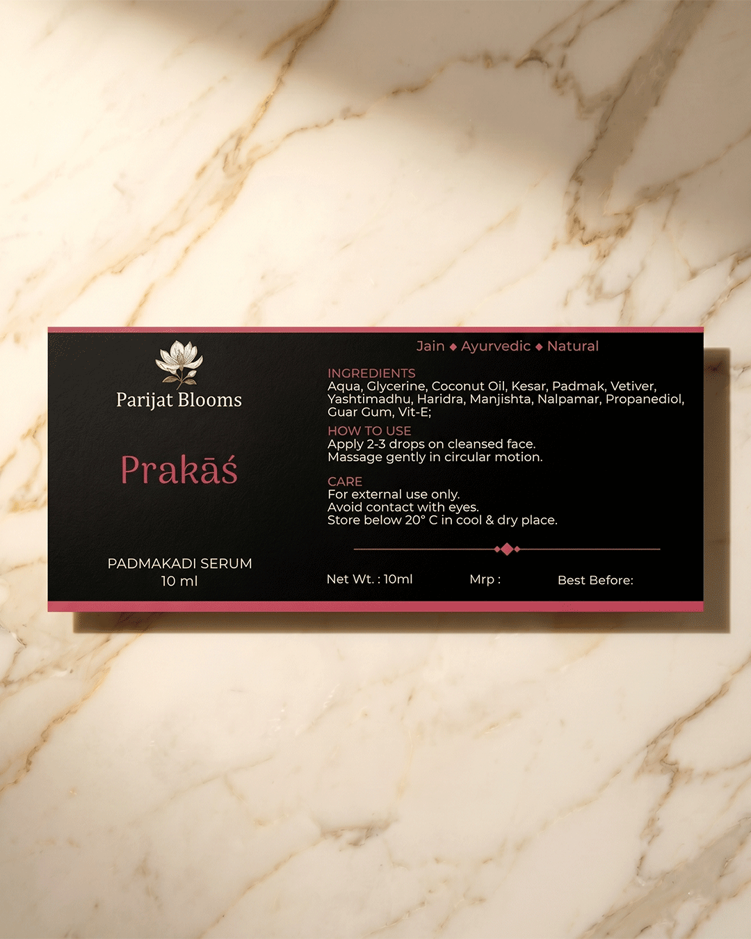 Prakas Padmakadi Kumkumadi Nalpamaradi Face Serum label and packaging — Jain Vegan natural face serum Parijat Blooms