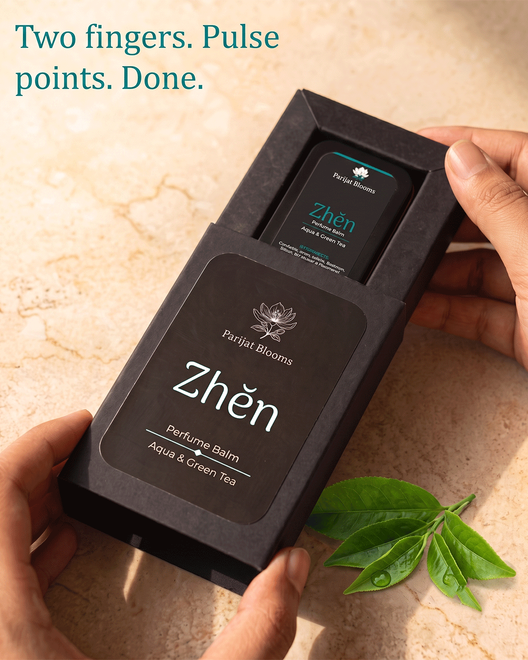 Zhen Aqua Green Tea Perfume Balm Ayurvedic ritual perfume balm in use — hand holding perfume balm Parijat Blooms India